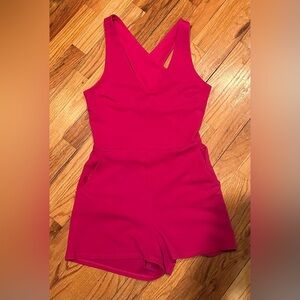 Crystal Sky Magenta Pink Sleeveless Crossback Romper with pockets